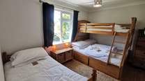 The bunk room has an additional single bed which is shorter than standard and only suitable for a child. 
