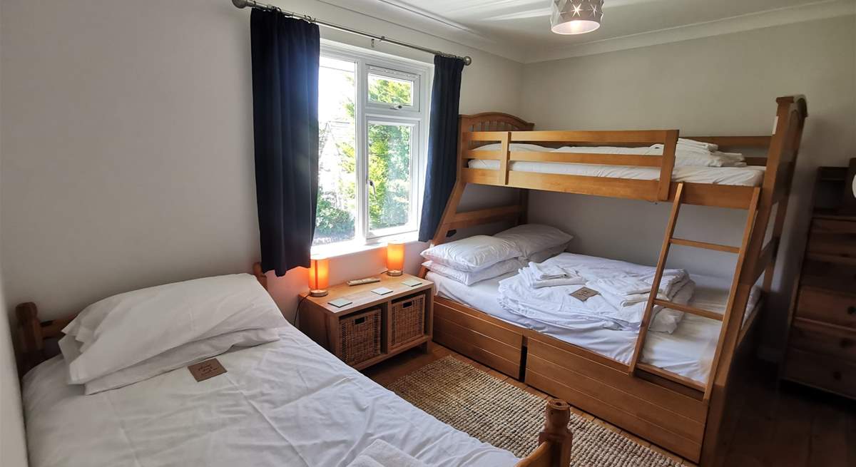 The bunk room has an additional single bed which is shorter than standard and only suitable for a child. 