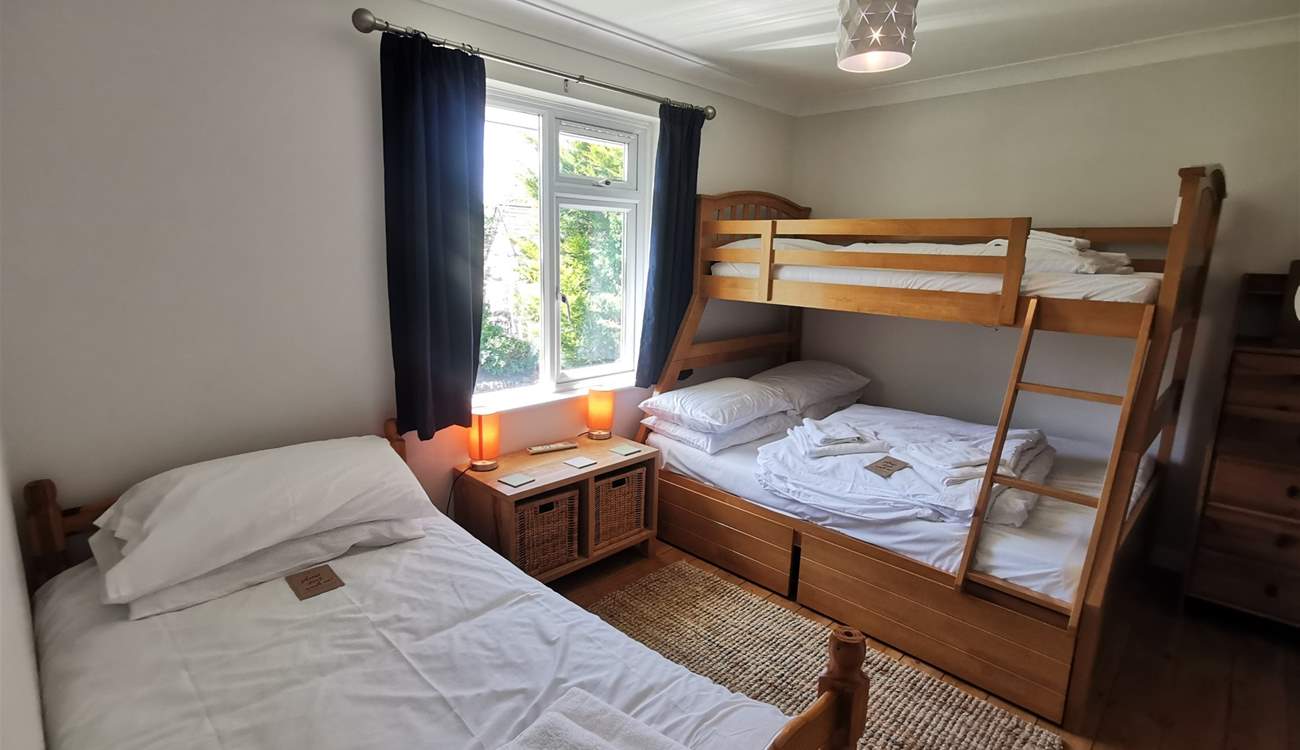 The bunk room has an additional single bed which is shorter than standard and only suitable for a child. 