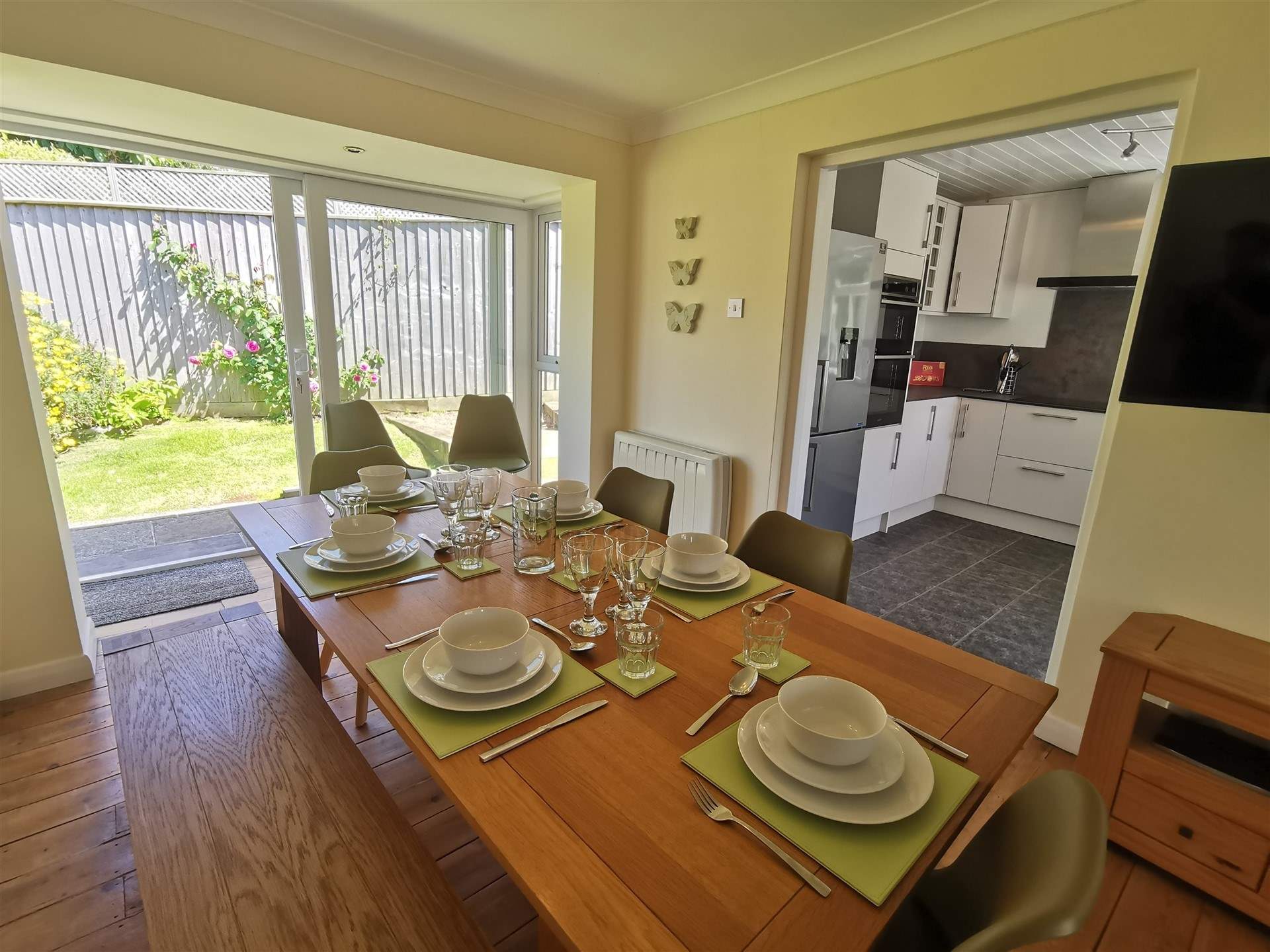 The dining-area has patio doors leading into the garden. 