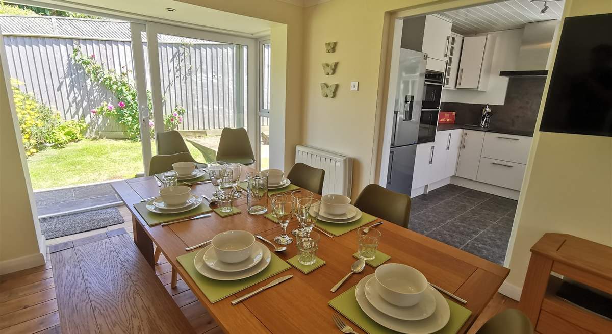 The dining-area has patio doors leading into the garden. 