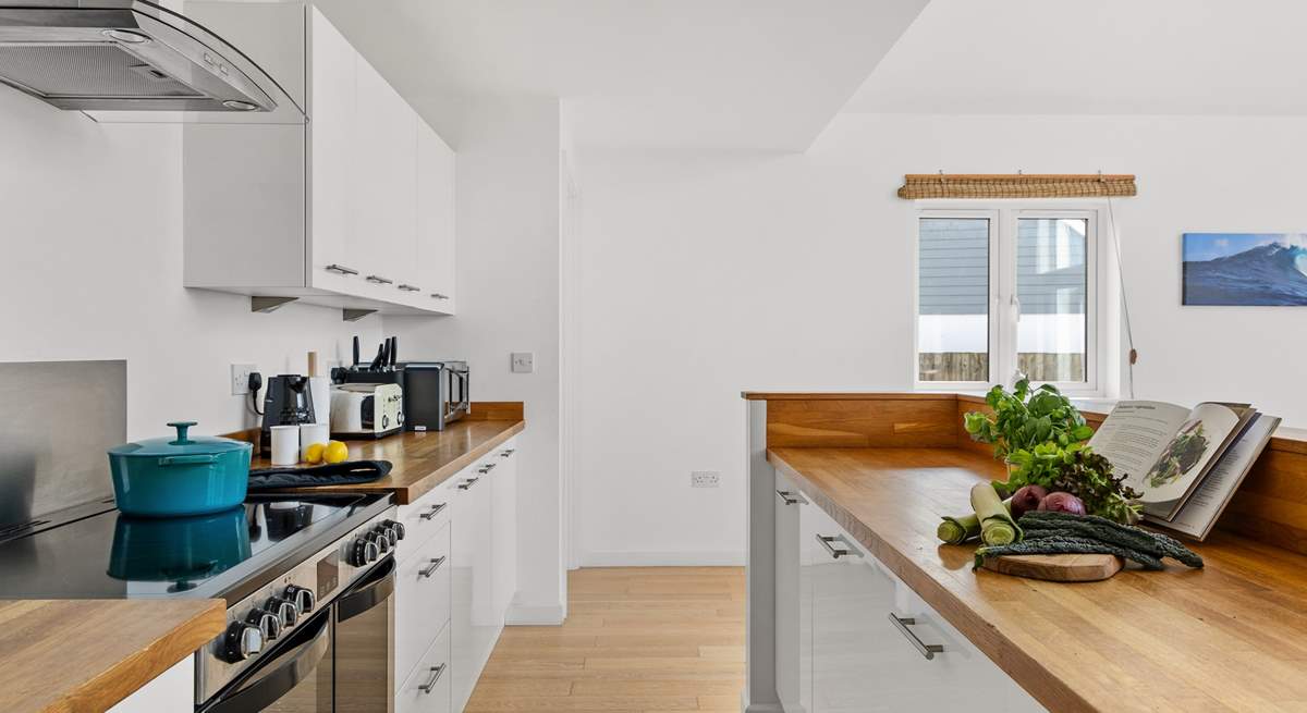 The fully equipped kitchen awaits your arrival.