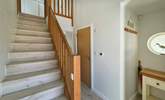 Stairs lead to the first floor with three bedrooms and the family bathroom.  - Thumbnail Image