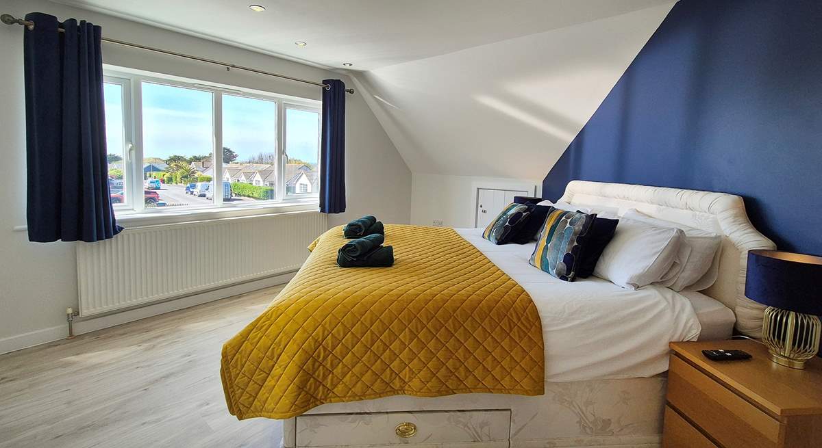 This gorgeous bedroom has a king-size double bed.