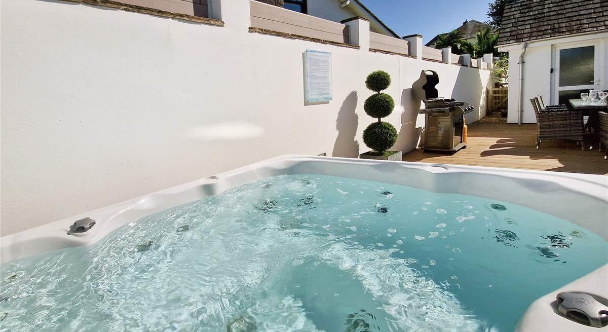 A dip in the hot tub is the ideal way to relax after a beach day. Additional charges apply for the hot tub.