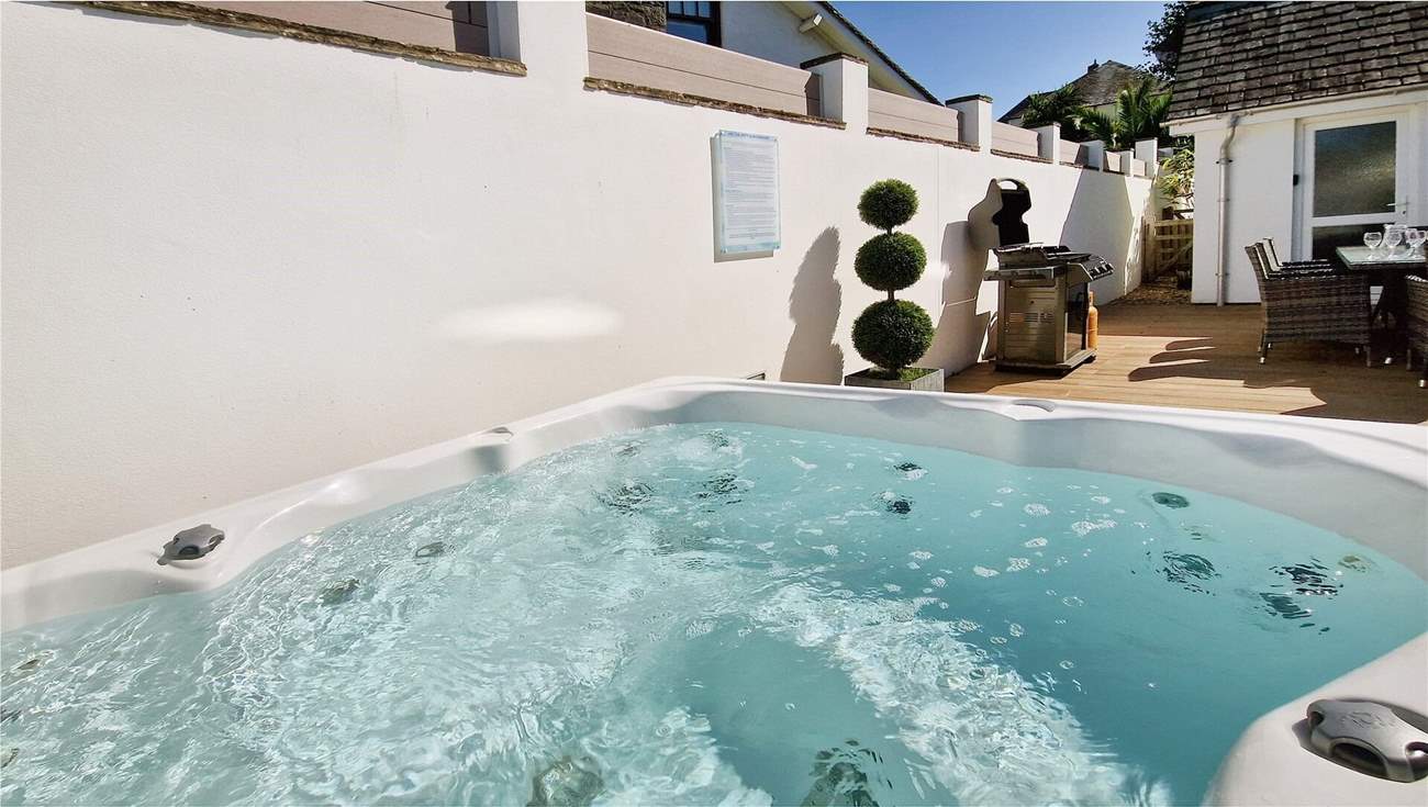 A dip in the hot tub is the ideal way to relax after a beach day. Additional charges apply for the hot tub.