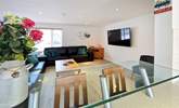 The living space is light and bright.  - Thumbnail Image