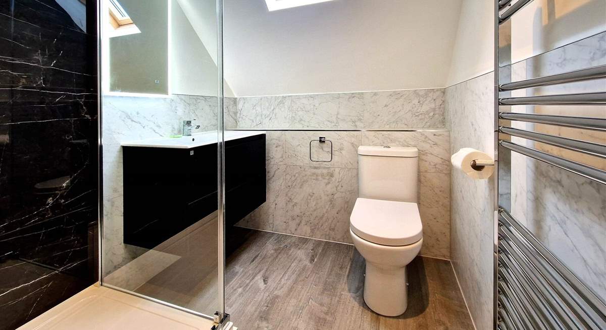 Bedroom 2 has an en suite shower-room. 
