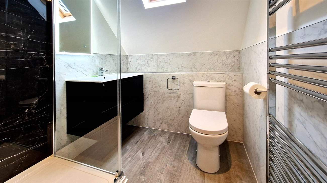 Bedroom 2 has an en suite shower-room.