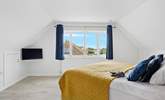 The bedrooms are light and bright. - Thumbnail Image