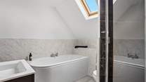 You can choose from a relaxing bath or a refreshing shower in the family bathroom.