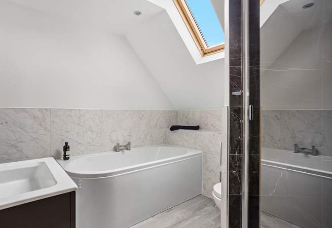 You can choose from a relaxing bath or a refreshing shower in the family bathroom.