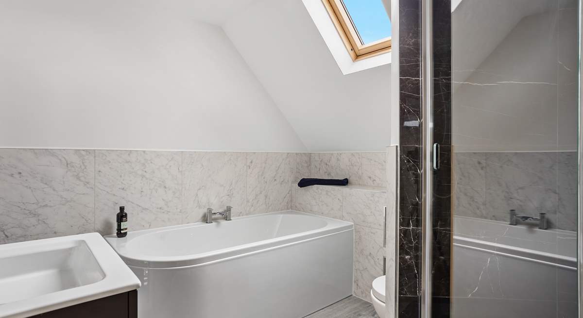 You can choose from a relaxing bath or a refreshing shower in the family bathroom.