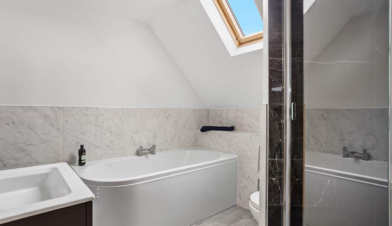 You can choose from a relaxing bath or a refreshing shower in the family bathroom.