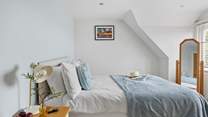 The bedrooms are beautifully designed for a great night's sleep. This is bedroom 3.