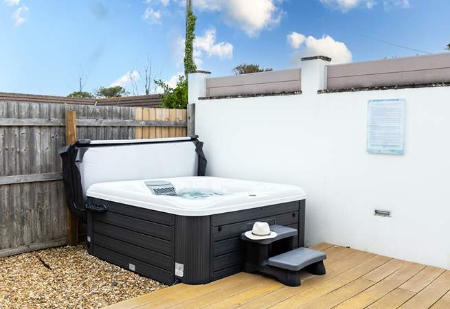 Enjoy a relaxing dip in the hot tub.