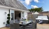 Enjoy dining al fresco on the decking area. - Thumbnail Image