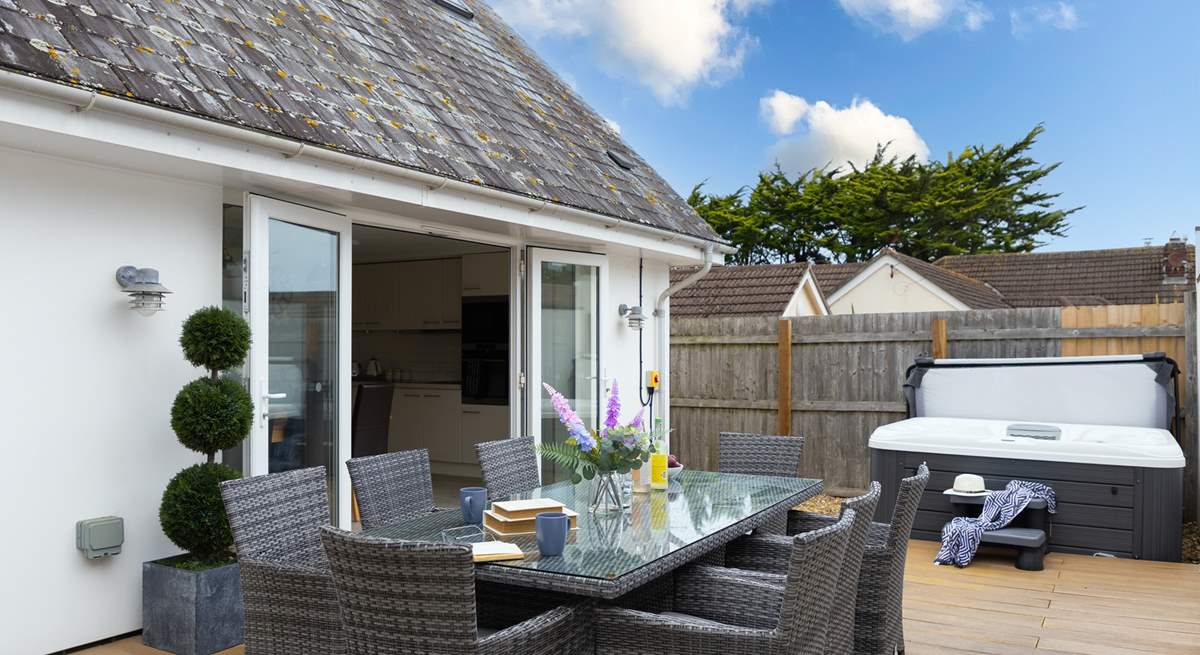 Enjoy dining al fresco on the decking area.