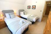 The twin bedroom on the first floor.