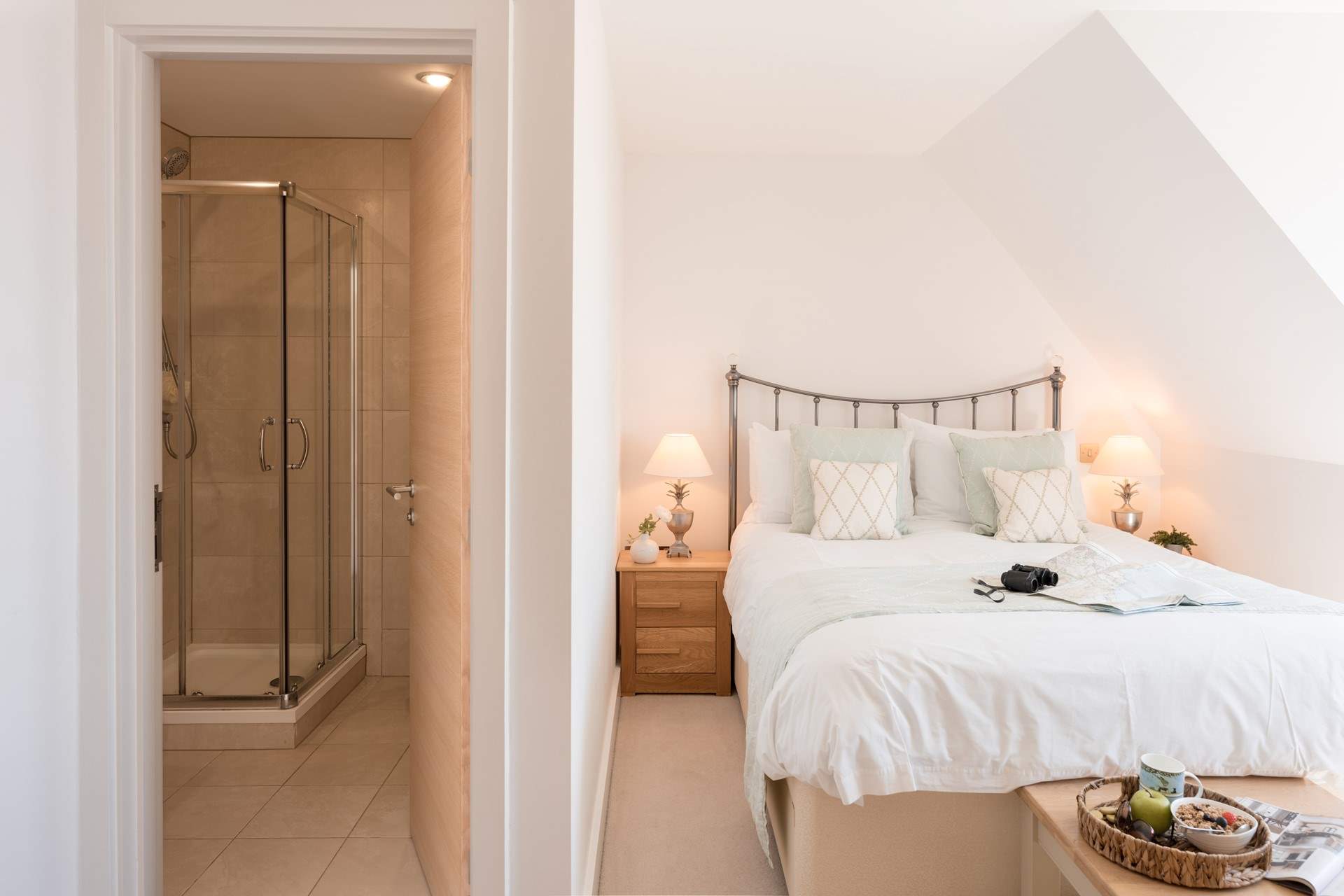 Bedroom 1 is also equipped with an en suite.