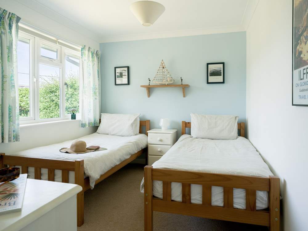 The pretty twin bedded room.
