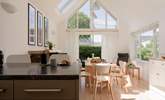 Chat with guests whilst dinner is prepared.  - Thumbnail Image