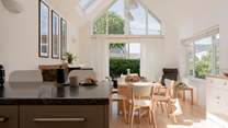 Chat with guests whilst dinner is prepared. 