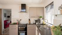 The stylish kitchen has all the equipment you will need. 