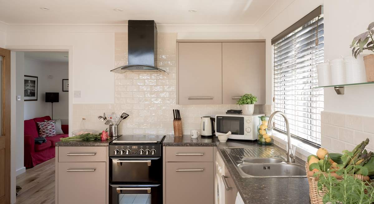 The stylish kitchen has all the equipment you will need. 