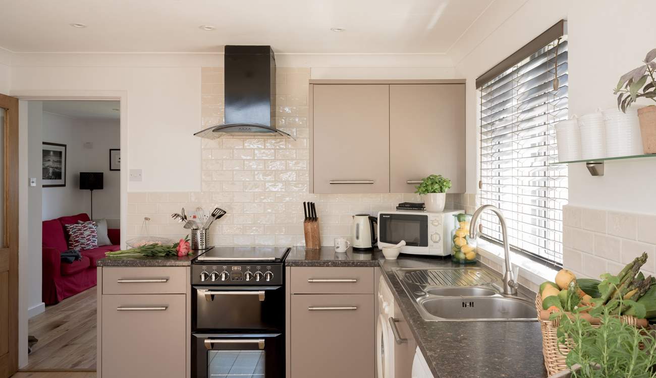 The stylish kitchen has all the equipment you will need. 