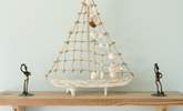 The nautical theme is a nod to the seaside location.  - Thumbnail Image