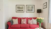 Snuggle up on the sofa and watch a movie on the Smart TV.