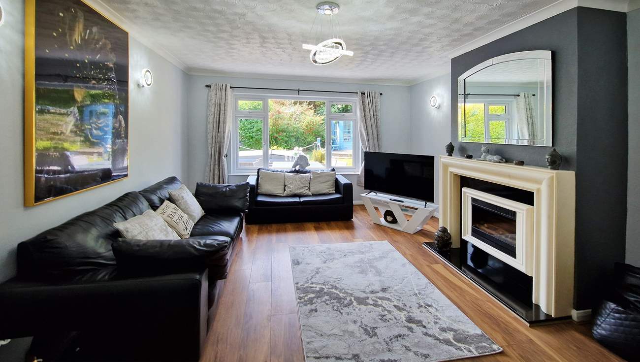 Relax in the comfortable sitting-room after a busy beach day.