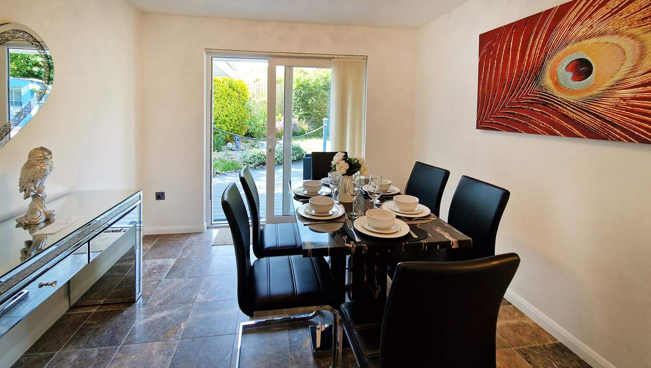 Chat about the adventures of the day around the table in the separate dining-room.