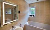 The family bathroom has a bath with shower over.  - Thumbnail Image