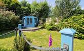 The enclosed garden is ideal for the family dogs to enjoy. - Thumbnail Image