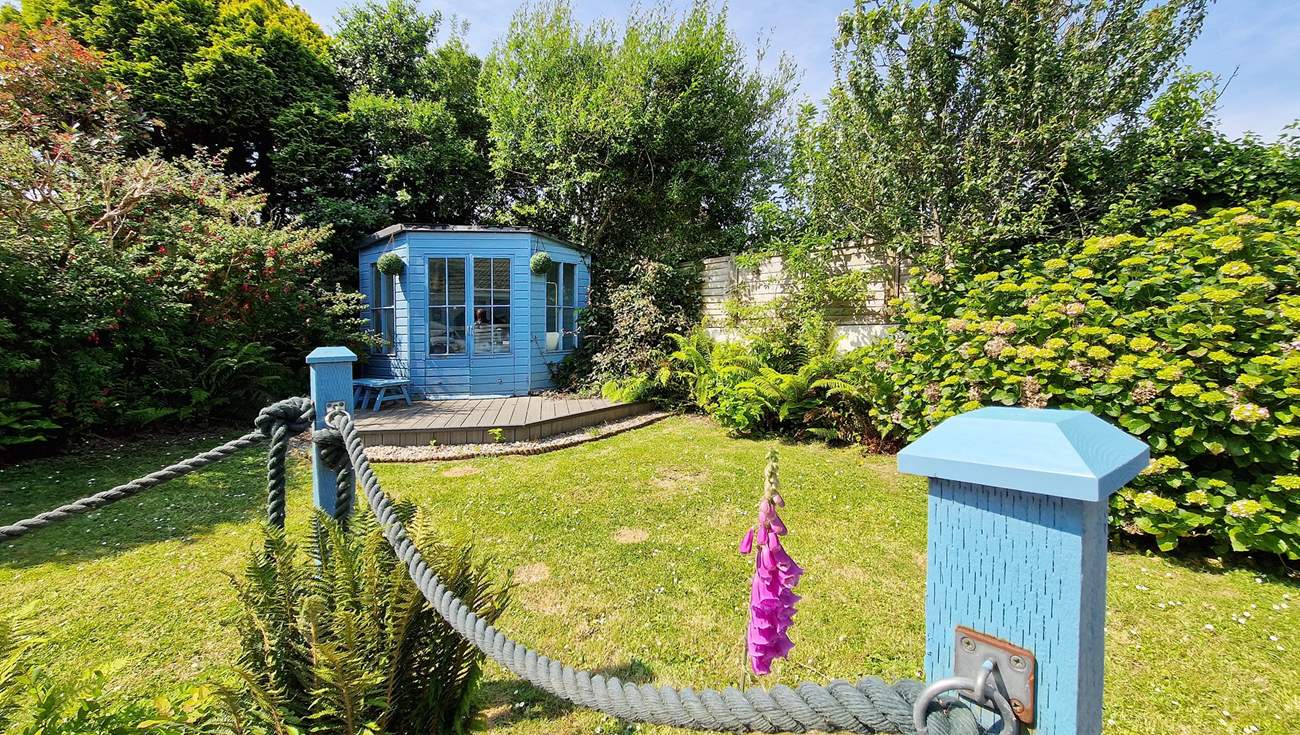 The enclosed garden is ideal for the family dogs to enjoy.
