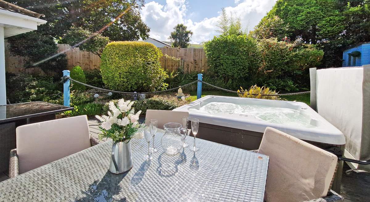 Enjoy the Devonshire sunshine in the secluded garden. 