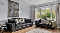 Relax in the comfortable sitting-room after a busy beach day.