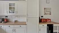 The kitchen is well-equipped.