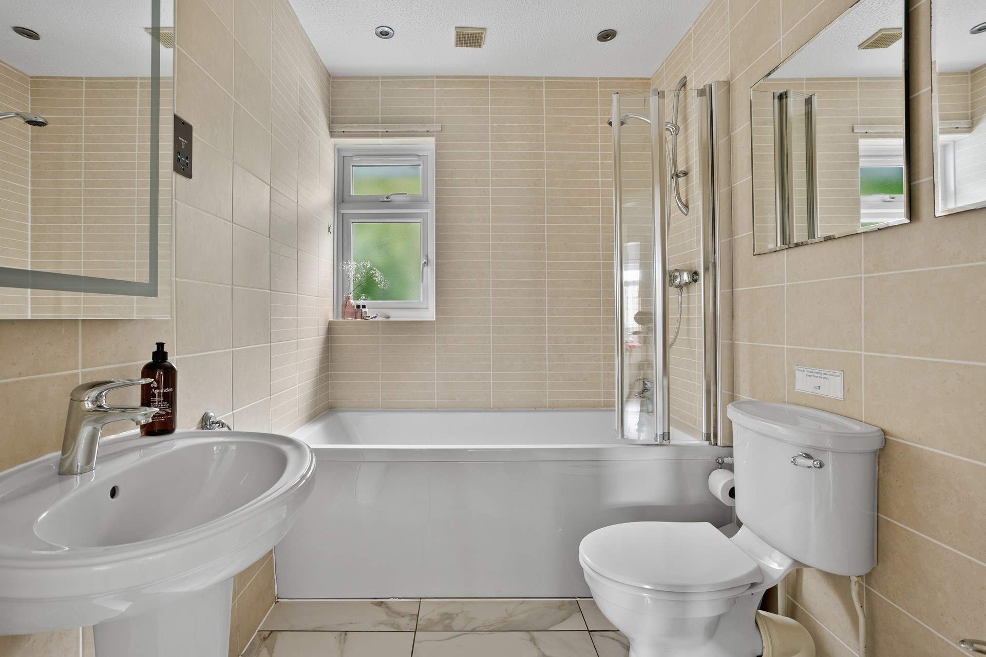 The family bathroom offers a bath or shower - perfect for rinsing sandy toes.