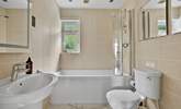 The family bathroom offers a bath or shower - perfect for rinsing sandy toes. - Thumbnail Image
