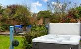 Take a dip in the hot tub whilst the children enjoy the enclosed garden. - Thumbnail Image
