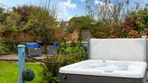 Take a dip in the hot tub whilst the children enjoy the enclosed garden.