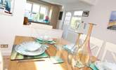 Gather everyone around the table and chat about the adventures of the day.  - Thumbnail Image