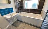 There is also a family bathroom with bath and shower over.  - Thumbnail Image