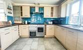 The stylish kitchen/diner has all you need to cook a holiday meal.  - Thumbnail Image