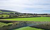 Views over the countryside to the sea and beyond.  - Thumbnail Image