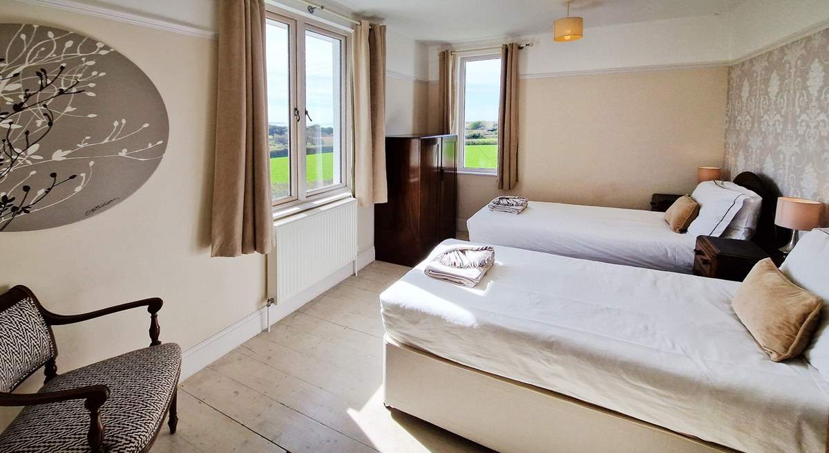 One of the twin bedrooms has a delightful dual-aspect view. 