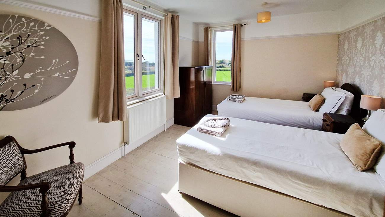 One of the twin bedrooms has a delightful dual-aspect view.